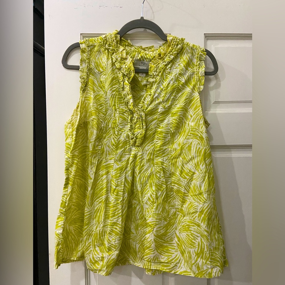 Ann Taylor LOFT sleeveless top with ruffle neck.